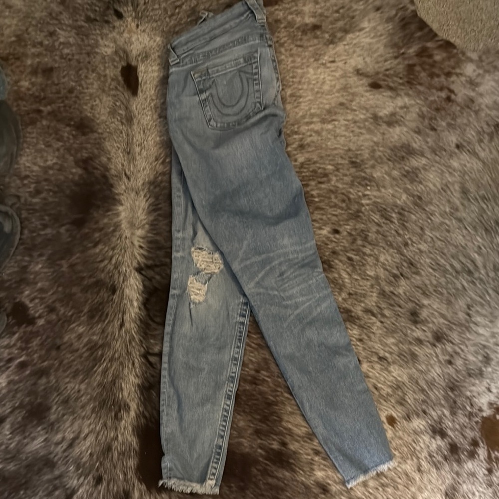 Women's Light Blue Distressed Jeans